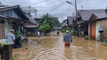 Ilustrasi banjir dan longsor yang merendam permukiman di Sumatera Utara